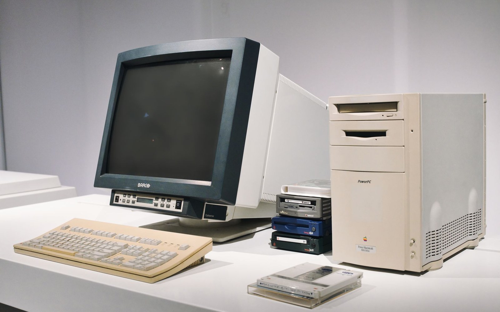 An early Netscape Navigator browser window on a mid-1990s CRT monitor, an adult seated at the keyboard