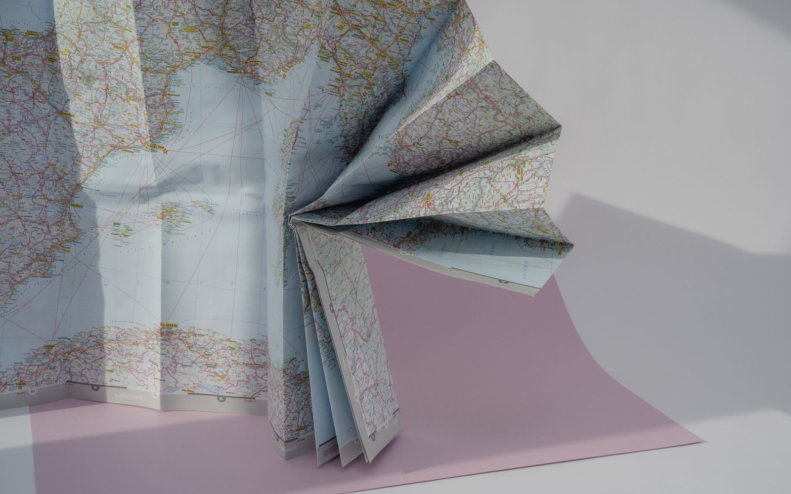 A 1960s ZIP-code zone map, printed and creased, lying on a desk